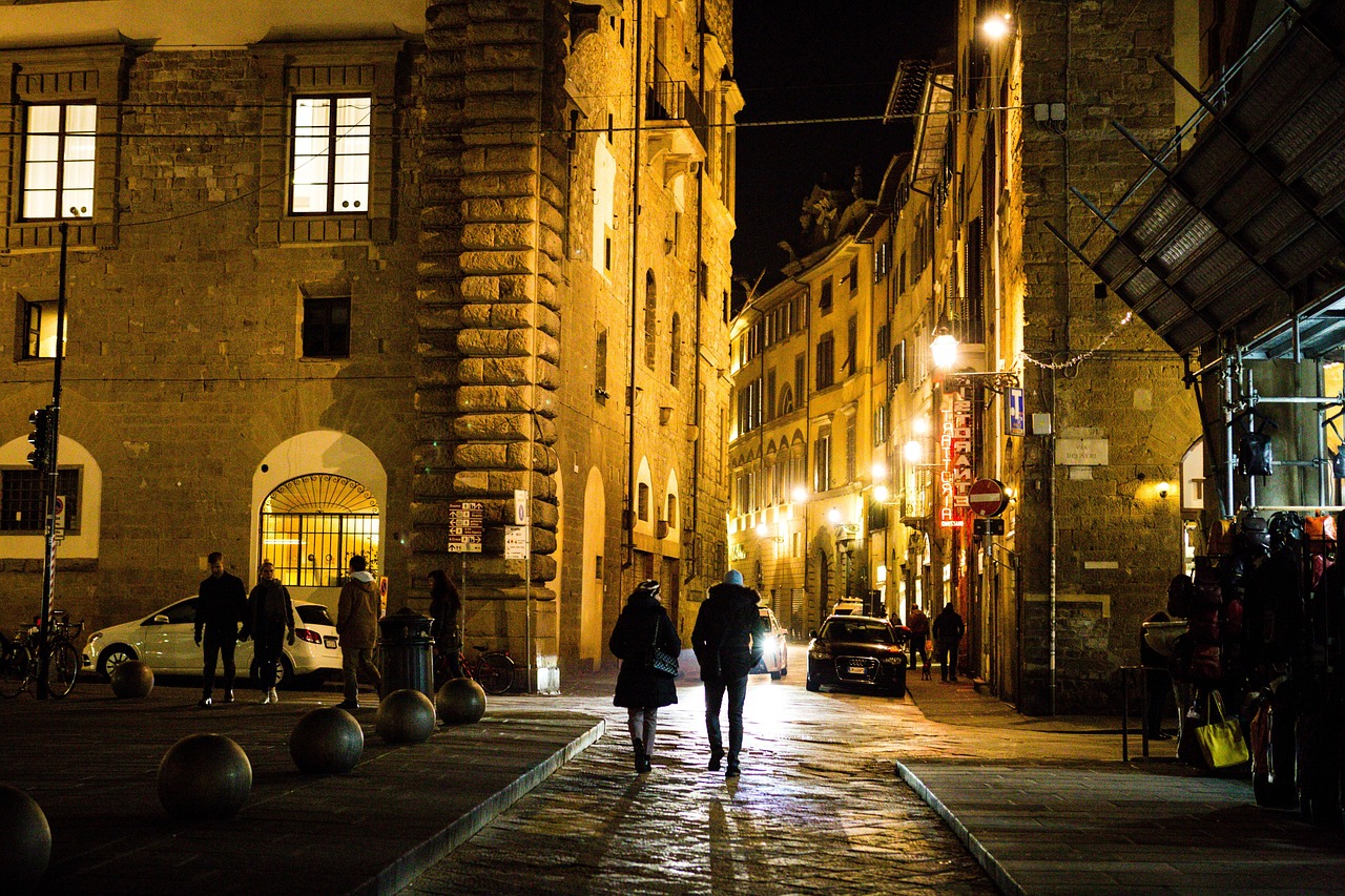 A couple on a cobblestone street in Europe